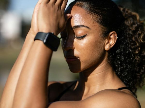Close-up of a person meditating with focused breathing.