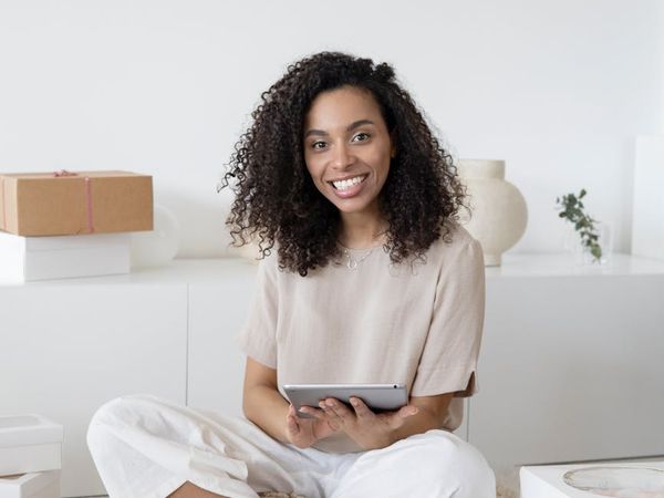 Person looking at a training schedule on a tablet.
